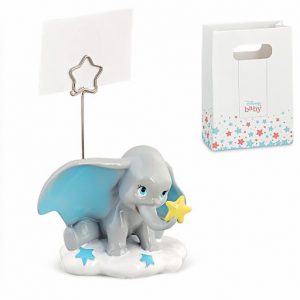 Memoclip Dumbo Disney, bomboniera realizzata in resina, Dumbo raffigurato seduto su una nuvola con stellina sulla proboscide e orecchio all'insù e asta in metallo con terminale a forma di stella in cui inserire bigliettini e foto bambini.