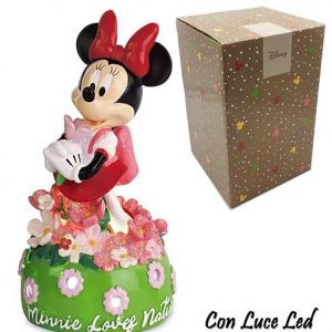 Lampada Minnie originale Disney realizzata in resina composta da una base rotonda di colore verde, raffigurante un prato fiorino, pieno di margherite rose e bianche impreziosite da polvere glitterata