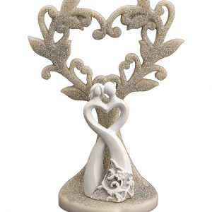 Bomboniera coppia sposi con albero della vita, intreccio dei rami a forma di cuore e dolcissima coppia stilizzata alla base in tonalità bianco e crema.