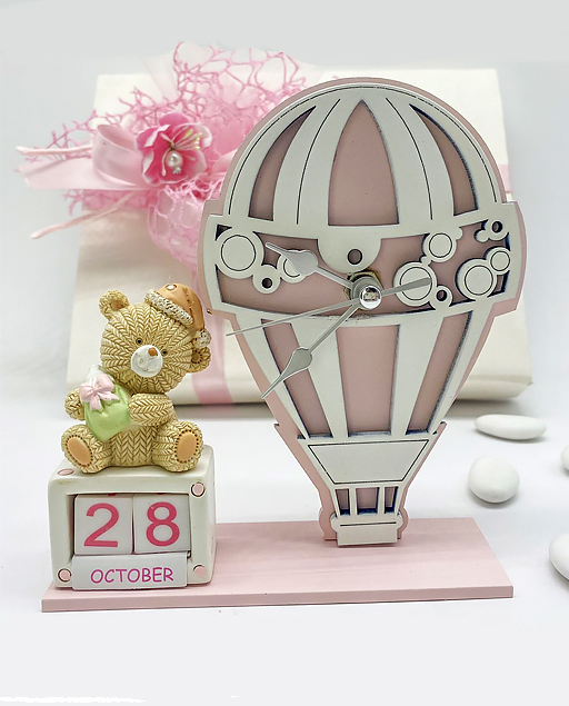 Orologio mongolfiera orsetto rosa con calendario perpetuo è un'idea particolare e dal design unico.