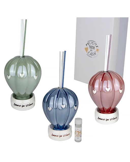 Mongolfiera diffusore realizzata in porcellana smaltata completa di bacchette e fialetta di essenza.