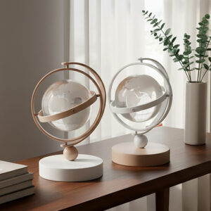 Bomboniera mappamondo da poggio realizzato da una base in legno con anelli metallici e una sfera in vetro effetto cristallo