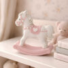 Bomboniera mini cavallo dondolo rosa realizzato in fine resina di alta qualità.