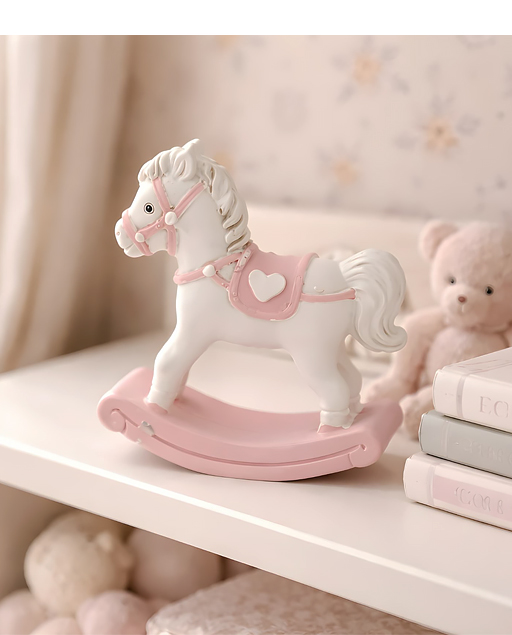Bomboniera mini cavallo dondolo rosa realizzato in fine resina di alta qualità.