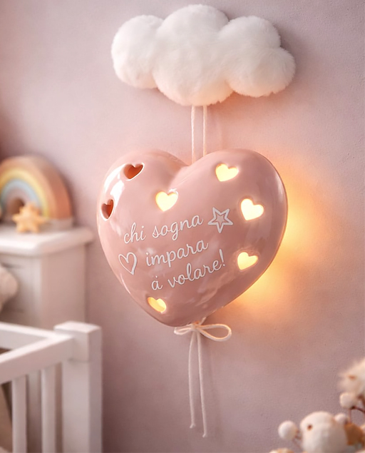 Lampada led cuore a forma di palloncino rosa con la frase “Chi sogna impara a volare”